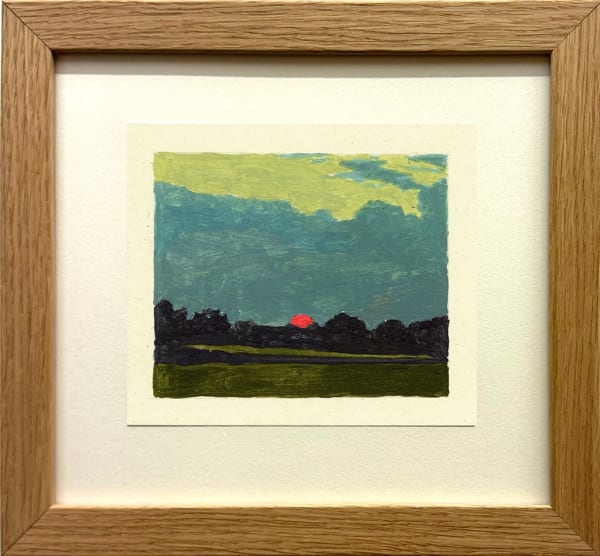 framed painting of a landscape with setting sun and pale yellow border