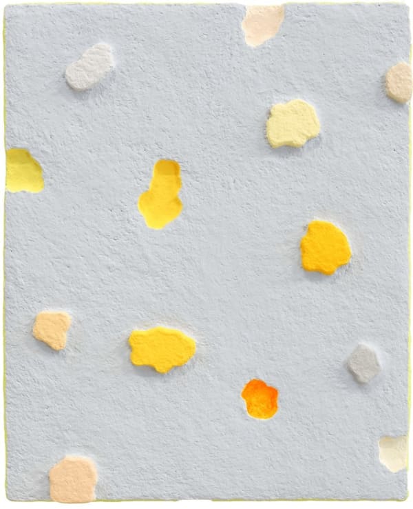 painting of 13 round bumpy pieces of "popcorn" on grey background