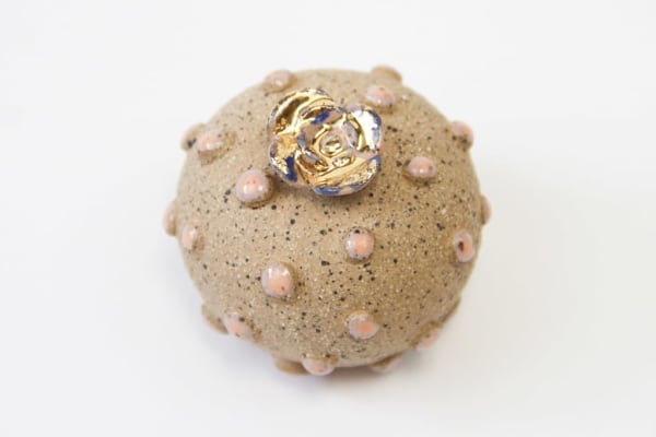 Jen Dwyer brown and pink sculpture of cactus with gold flower on top