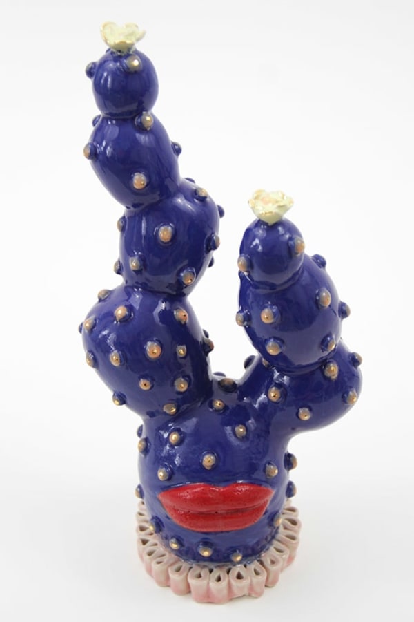 Jen Dwyer sculpture - blue cactus plant with large red lips on bottom