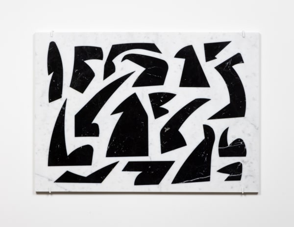 Wall-mounted, white rectangular marble slab inlaid with several black marble shapes resembling abstract bird-like forms with beaks.