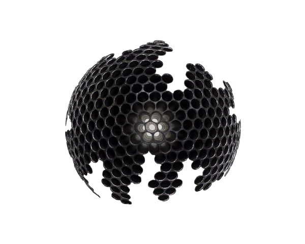 Plastic with hexagonal pattern on surface painted matte black and curved to form an incomplete globe