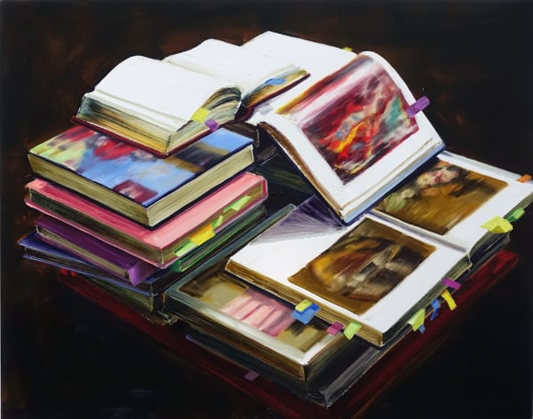 Stacks of books with colorful covers and many Post-it notes sticking out to mark important pages. Books on top are open, revealing blurry colorful images.