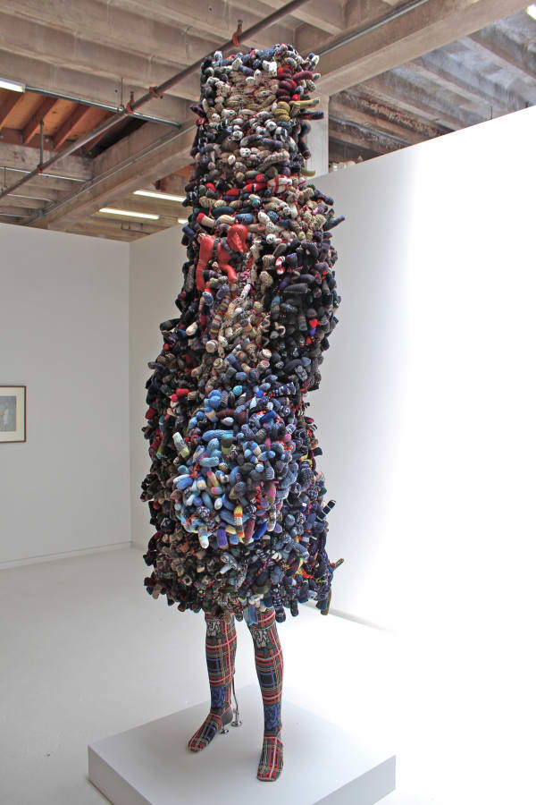Nick Cave Soundsuit, 2012 mixed media including sock monkeys, sweaters, and pipe cleaners 112 x 42 x 33 inches