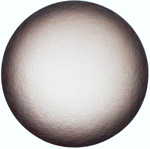 Layers of multi-colored threads strung across a round wooden and plaster panel create the effect of a large glowing white center that is encircled by a thin dark border