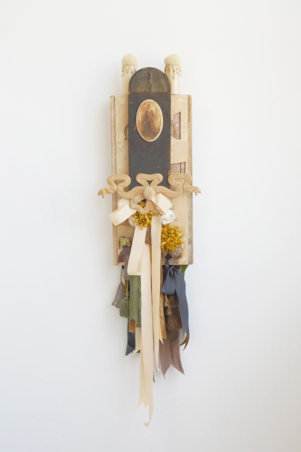 Bryan Keith Thomas Sharp, 2024 mixed media, wool, silk, antique knife sharpener, heirloom bag, tea tag on wood 53 x 14 x 5 in 134.6 x 35.6 x 12.7 cm
