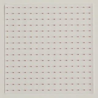 Series of black dots against white background in grid formation are blurred to create the illusion of right-ward movement.