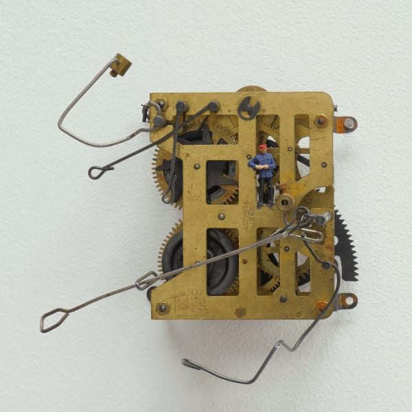 Liliana Porter The Clock Keeper, 2022 broken clock and figurine 5 x 4 1/2 x 2 3/4 in 12.7 x 11.4 x 7 cm