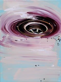 Close-up of metal drain encircled by purple rim within light blue sink.