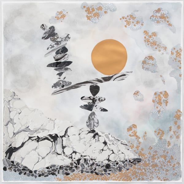 Mixed media landscape of multiple black and white marbled stones of various sizes stacked on top of each other at the center of the piece The stones are stacked on top of a mountain and climb so high that it seems as if one of the stones is balancing the gold metallic moon that floats in the sky