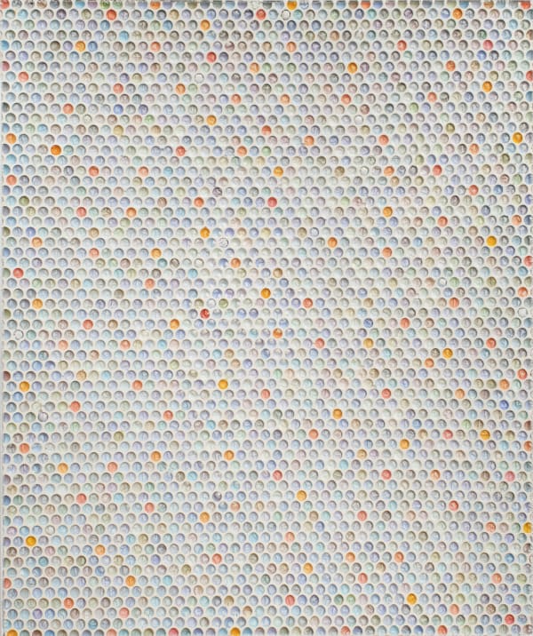 Bubble wrap indents cast into plaster and painted in light blues greens and purples with a few oranges done randomly