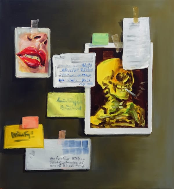 Blurred items taped to brown wall, including: pictures of a skeleton smoking a cigarette and a woman’s mouth and nose, postcards, an envelope and other pieces of paper.
