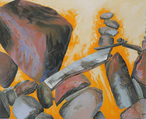 An image of painted boulders and rocks with an orange yellow background.