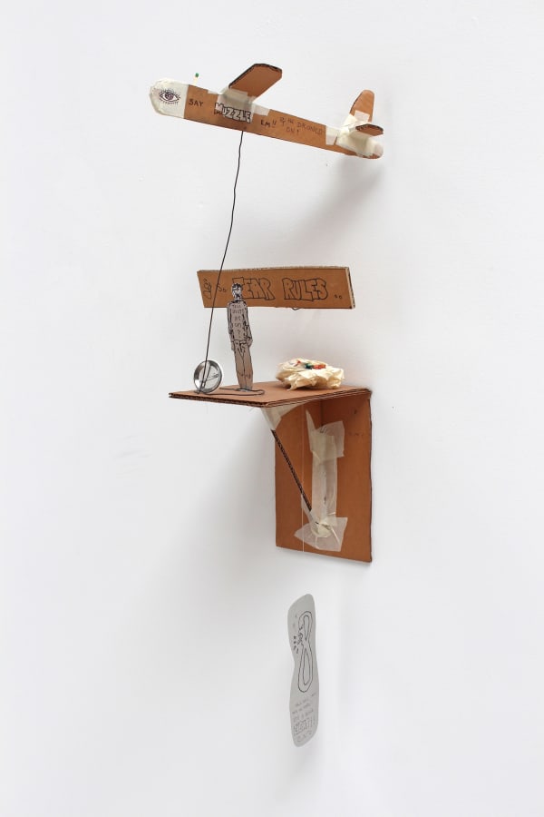 William T. Wiley Just Us Drone Dawn, 2013 corrugated cardboard, masking tape, sheet metal, wire, found object, matchstick, and Sharpie 30 x 10 x 12 in 76.2 x 25.4 x 30.5 cm