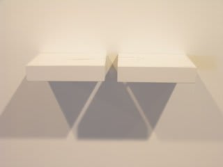 Marco Maggi American Ream 1,2, 2009 cuts and folds on paper, 2 wooden shelves 3.5 x 25 x 11.5 inches 8.9 x 63.5 x 29.2 cms