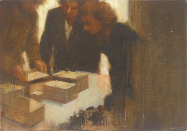 Two women lean in to overlook several boxes on a table. A third person to their left lifts the lid off of one.