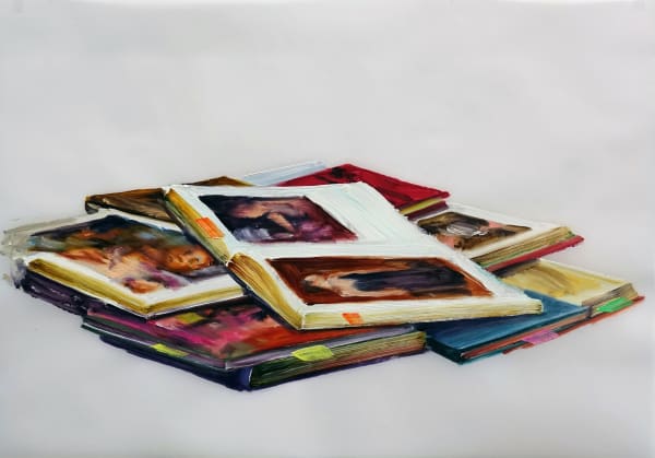 Several books stacked on top of each other are open to pages featuring paintings of women, monkeys and other subject matter. All books have colorful Post-it notes sticking out to mark certain pages.