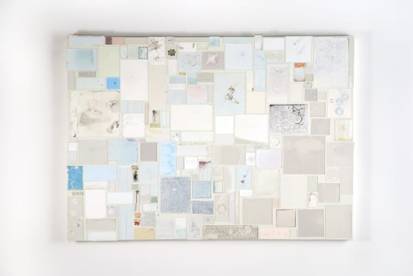 Mixed media collage of pastel papers, thread, drawings and various materials