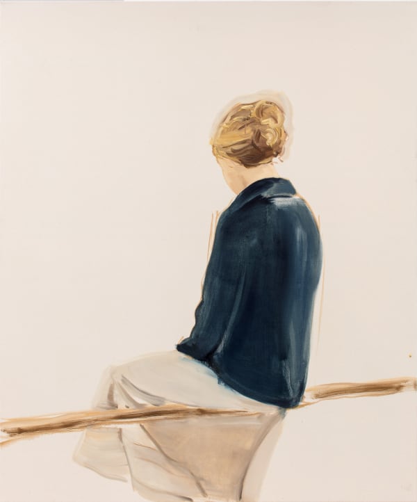 Seated woman in blue coat and white skirt faces away from viewer in front of plain white background.