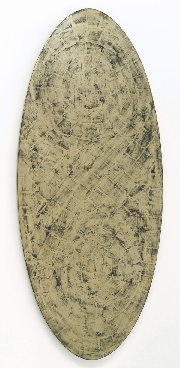 Elongated oval panel with moon gold leaf covered in thin black clay which reveals the edge marks from the gold leaf squares