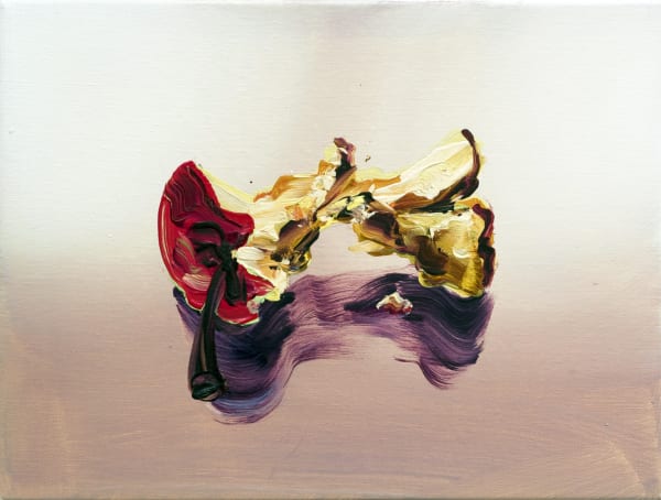 Chewed apple core casts dark reflection against plain beige background.