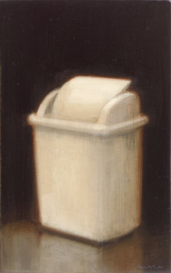 A white trash can stands on the ground against a dark background. The lid is slightly open.