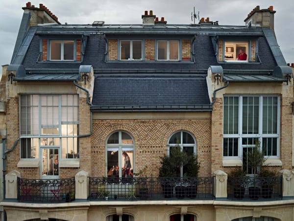 Gail Albert Halaban Out My Window Paris Bis rue de douai, Paris, 9e, le 21 mai, man woman man on phone in windows building with balcony architecture
