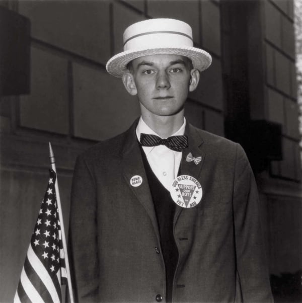 Diane Arbus, Boy with a Straw Hat Waiting to March in a Pro-War Parade, NYC, 1967
