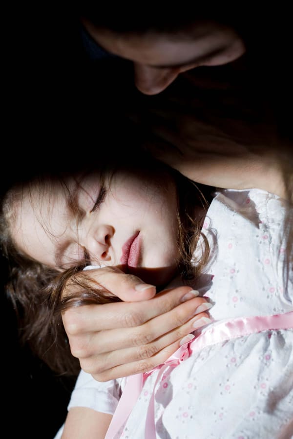 Elinor Carucci photograph of the artist holder her sleeping daughter