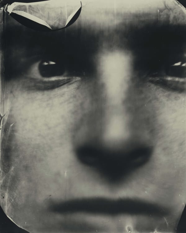 Sally Mann portrait of Emmett's face close up with tear over eyebrow from her Faces portrait series