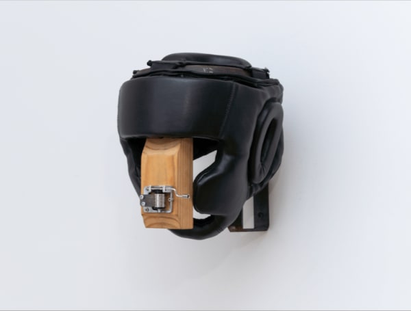 Priscilla Monge Callese y cante/ Shut Up and Sing, 1997-98 Metal, wood, boxing helmet and music box 10 x 8 in 25.4 x 20.3 cm