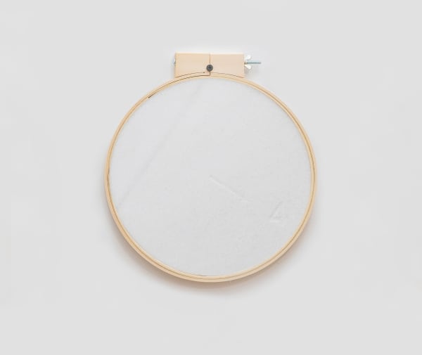 Priscilla Monge Instrumento de medición, 2014 Engraved marble and embroidery hoop Diameter 11 3/4 in 30 cm