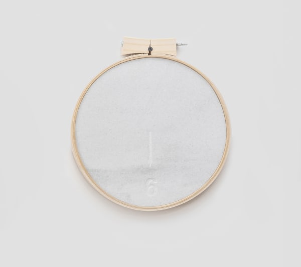 Priscilla Monge Instrumento de medición, 2014 Engraved marble and embroidery hoop Diameter 11 3/4 in 30 cm