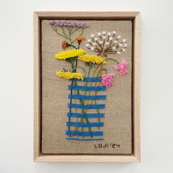 Some Random Flowers From the Summer That Never Came in a Striped Vase