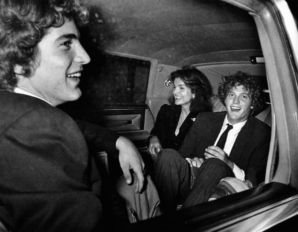 Ron Galella, John Jr., Jackie & Ted Kennedy Jr. at the pre-dedication party for the JFK Library at the University of Massachusetts in Dorchester, October 19, 1979