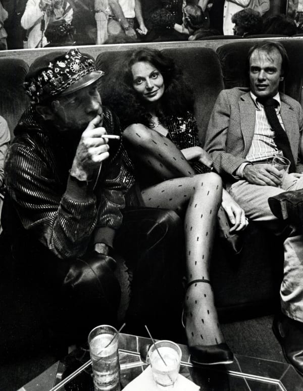 Ron Galella, Cedric Lopez, Diane von Furstenberg and Ara Gallant attend the party for Egon von Furstenberg's book "The Power Look" at Studio 54, New York City, September 25, 1978