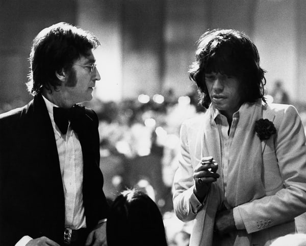 Ron Galella, John Lennon and Mick Jagger at American Film Institute Salute to James Cagney at Century Plaza Hotel in Los Angeles, 1974