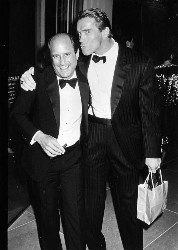 Ron Galella, Arnold Schwarzenegger and Ronald O. Perelman at "The Fire & Ice Ball" held at the Beverly Hilton Hotel, Beverly Hills, California, March 13, 1990