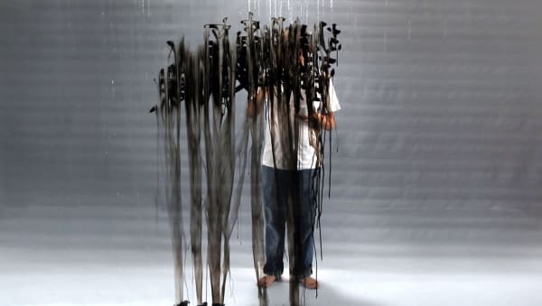 FX Harsono, Writing in the Rain, Performance Video Stills, 2012