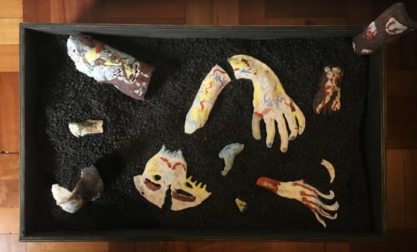 Ulises Mazzucca Restos de una Promesa: T.L.C.L.Q.M.D.T.O.D, 2019 Carved and patinated wood, black gravel, black and white ceramic with slip and ceramic chalk 20 x 100 x 75 cm