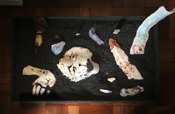 Ulises Mazzucca Restos De Una Promesa: E.L.N.N.M.E.L.P.F., 2019 Carved and patinated wood, black gravel, black and white ceramic with slip and ceramic chalk 20 x 100 x 75 cm