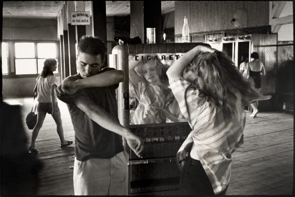 Bruce Davidson, Brooklyn Gang (Girl Fixing Hair in Cigarette Mirror), 1959