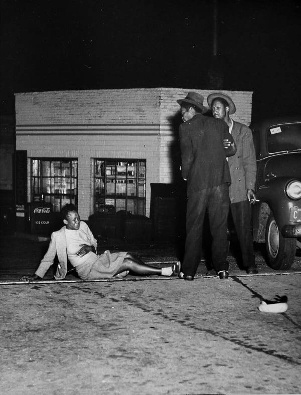 Weegee Milwaukee (Woman knocked over in a brawl), 1948 SOLD