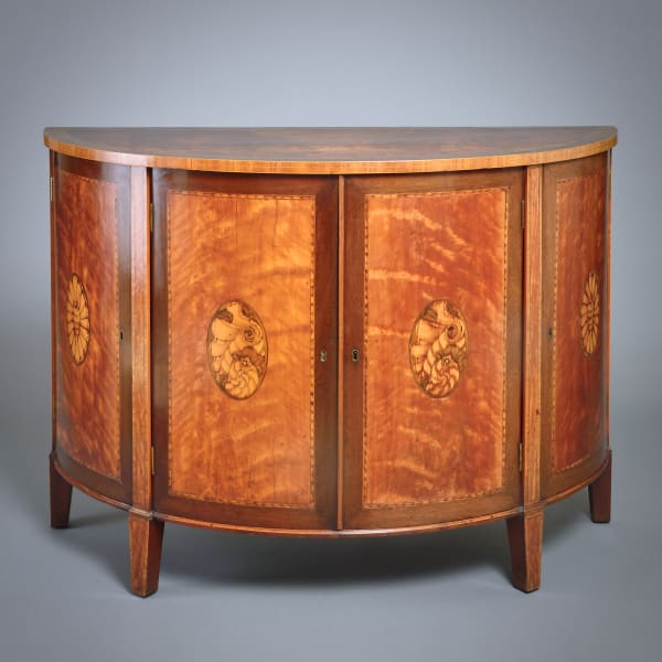 GEORGE III SATINWOOD, AMARANTH AND MARQUETRY COMMODE BY GILLOWS