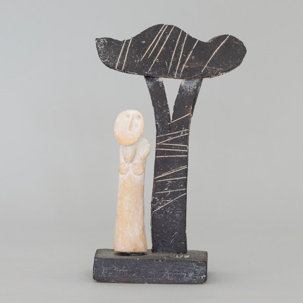 Female figure and tree