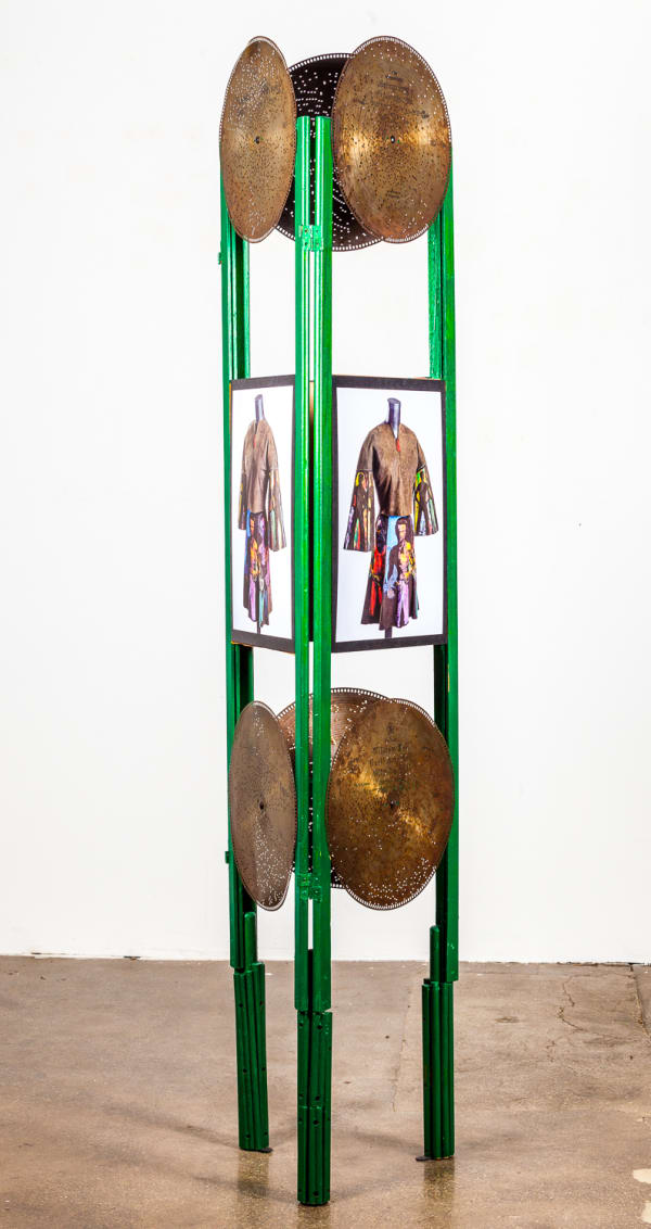 Jae Jarrell Brothers Surrounding Sis in Ornamented Screen, 2017 Painted wood, antique player piano discs, and photographs 64 x 14 x 14 in 162.6 x 35.6 x 35.6 cm