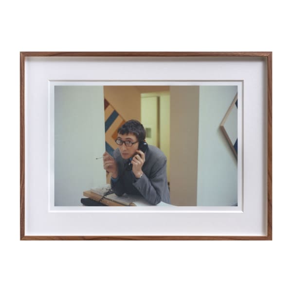 Kasmin, Kasmin at his gallery's front desk during the Kenneth Noland show, 1965