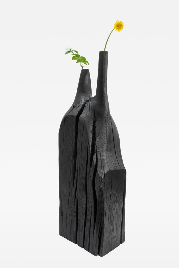 Patrick Kim-Gustafson Double barrel flower vase, 2024 French oak, burnt, brushed, ebonised and burnished 97 x 20 x 29 cm (38 1/4 x 7 7/8 x 11 3/8 in) Vase diameter: 3 cm (1 1/8 in)