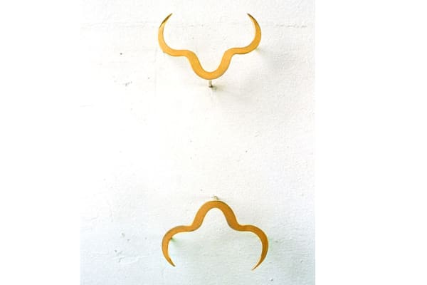 Barbara Zucker Nose Job, 1994 bronze plate 2 units, 2.5 x 2.5 in. each