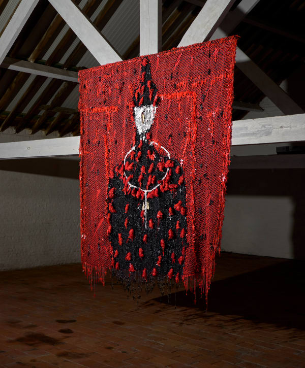 Victor Ehikhamenor Òkàlénté Noble Keeper of Secrets, 2022 rosaries, fabric and thread with bronze statuette and rhinestones on lace textile 271.8 x 199.4 cm 107 x 78 1/2 in